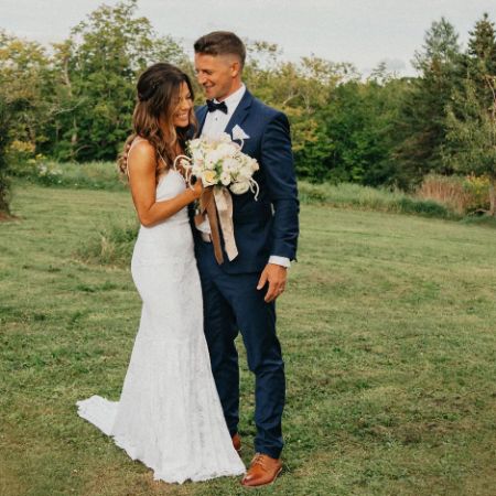 Jackie Redmond and her husband, Emmett Blois, were photographed at their wedding.